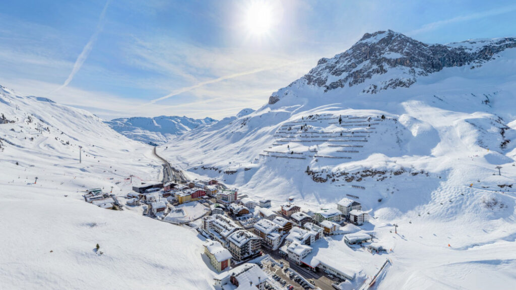 Aerial view of Lech Zürs am Arlberg ski area during the 2020 World Cup event, with snow-covered slopes and the village below.